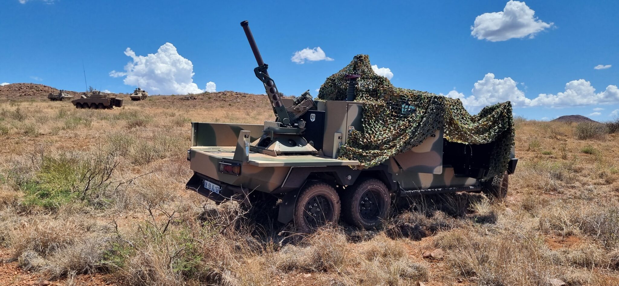 Scorpion automated mortar system mounted on a military vehicle